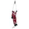 Santa Claus With Small Green Backpack On A Ladder