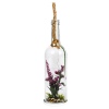 Glass Bottle With Plant [428357]