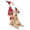 Santa Figurine Standing On Sleigh