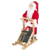 Santa Figurine Standing On Sleigh